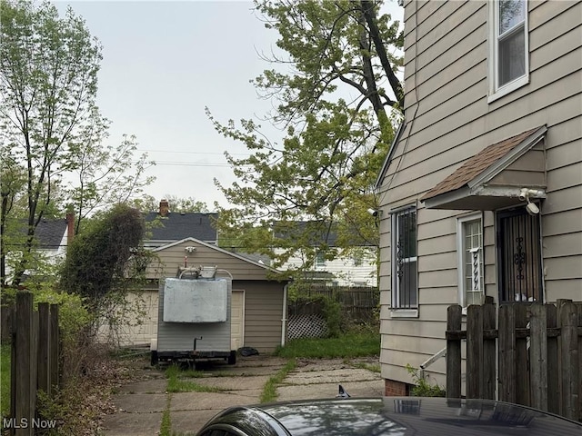 16707 Stockbridge Ave, Cleveland, OH 44128 - view of home's exterior featuring an outbuilding