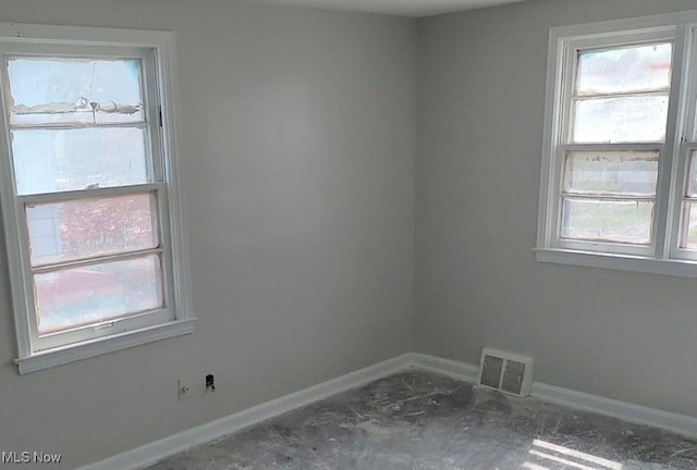 16109 Delrey Ave, Cleveland, OH 44128 - spare room with plenty of natural light and baseboards
