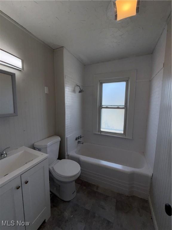 15002 Kingsford Ave, Cleveland, OH 44128 - bathroom with toilet, vanity, and bathtub / shower combination