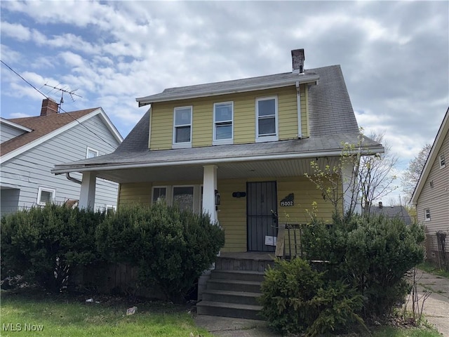 15002 Kingsford Ave, Cleveland, OH 44128 - view of front facade featuring covered porch
