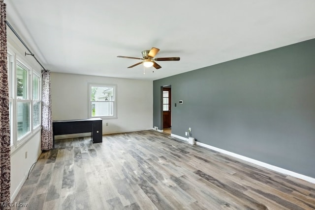 1795 Far View Rd, Green, OH 44312 - empty room featuring wood finished floors, ceiling fan, and baseboards