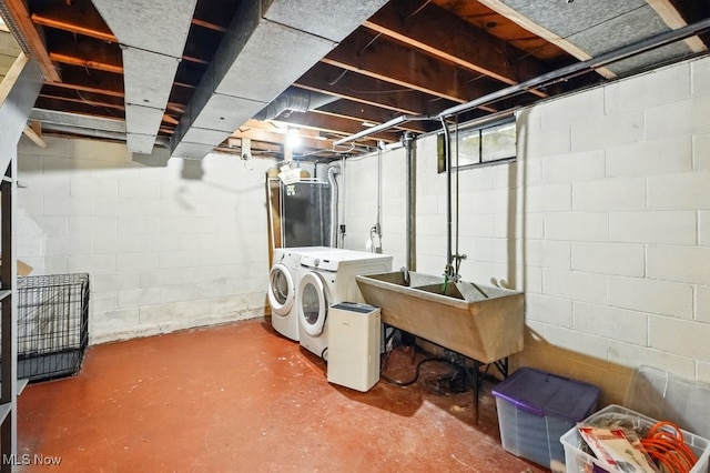 1795 Far View Rd, Green, OH 44312 - unfinished below grade area with washer and dryer and a sink