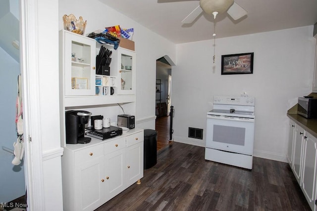 208 Como St, Struthers, OH 44471 - kitchen featuring electric range, dark wood-style flooring, a ceiling fan, and white cabinetry
