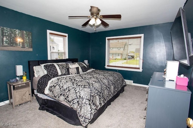 208 Como St, Struthers, OH 44471 - carpeted bedroom with baseboards and ceiling fan