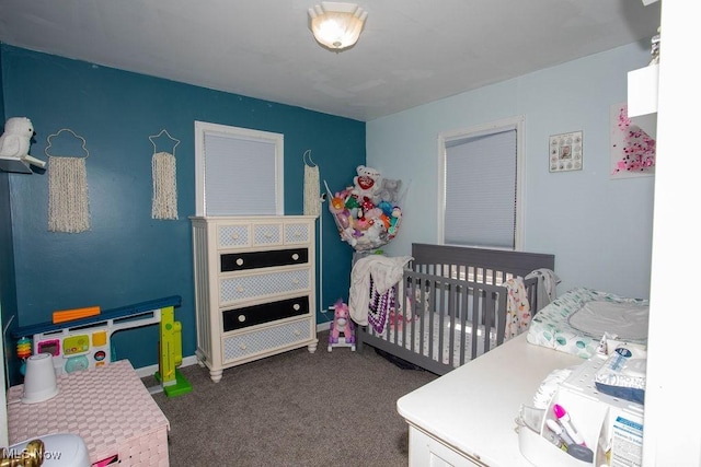 208 Como St, Struthers, OH 44471 - carpeted bedroom featuring a nursery area and baseboards