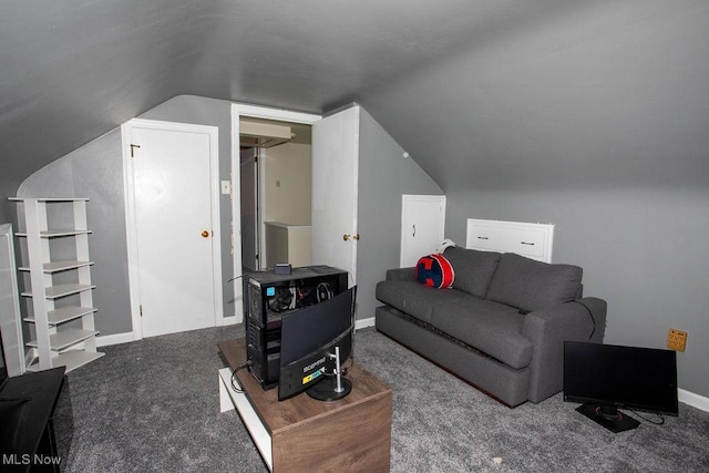 208 Como St, Struthers, OH 44471 - carpeted living room with vaulted ceiling and baseboards