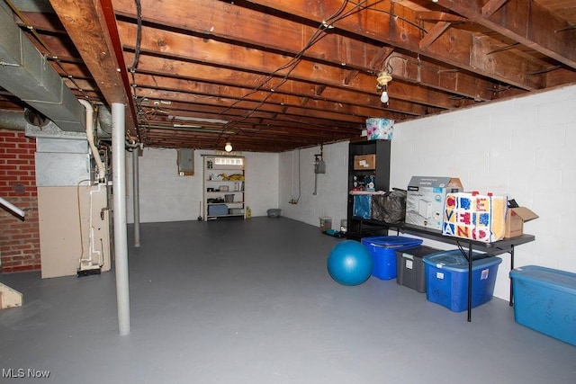 208 Como St, Struthers, OH 44471 - unfinished basement featuring electric panel and heating unit