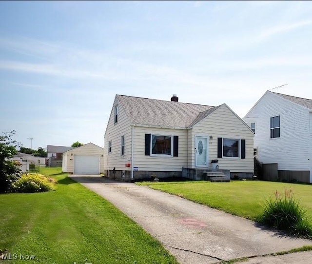 208 Como St, Struthers, OH 44471 - bungalow with an outbuilding, roof with shingles, a chimney, a front yard, and a detached garage