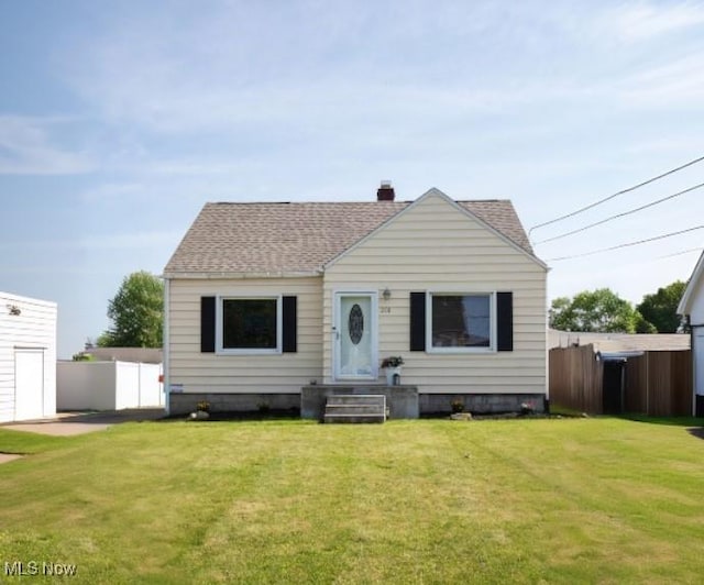 208 Como St, Struthers, OH 44471 - bungalow featuring a shingled roof and a chimney