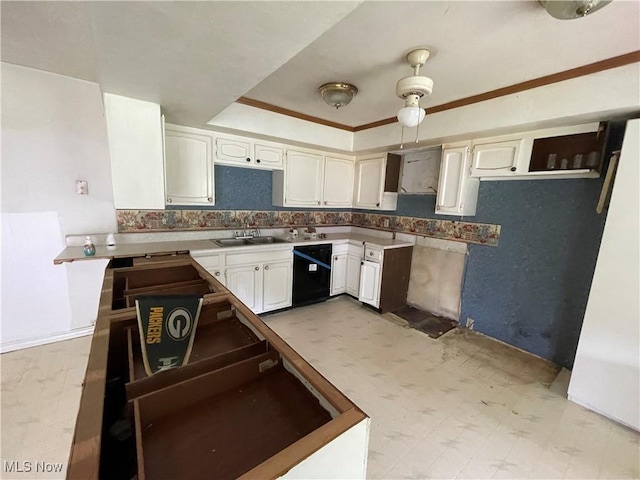 17184 State Route 45, Wellsville, OH 43968 - kitchen with a sink, a raised ceiling, light floors, white cabinets, and light countertops