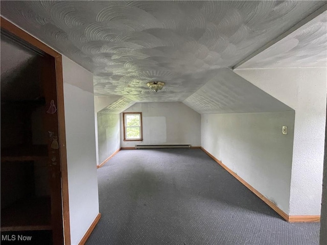 17184 State Route 45, Wellsville, OH 43968 - bonus room featuring carpet, a baseboard radiator, baseboards, and lofted ceiling