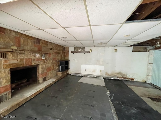 17184 State Route 45, Wellsville, OH 43968 - unfinished basement featuring a drop ceiling and a fireplace