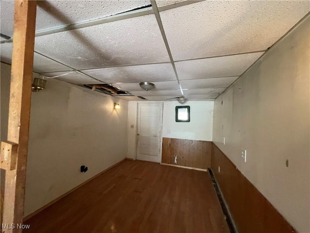 17184 State Route 45, Wellsville, OH 43968 - below grade area featuring wood finished floors, wainscoting, wood walls, and a drop ceiling