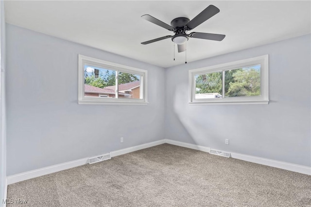 525 Cynthia Dr, Campbell, OH 44405 - empty room with carpet floors and ceiling fan
