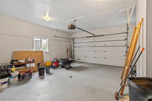 525 Cynthia Dr, Campbell, OH 44405 - garage featuring a garage door opener