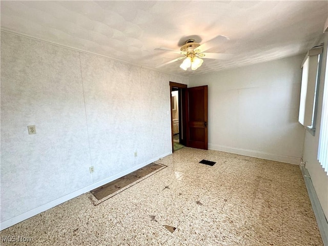 808 Gilbert Ave, Follansbee, WV 26037 - spare room featuring baseboards and ceiling fan