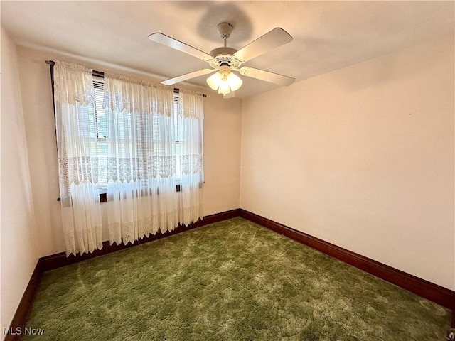 808 Gilbert Ave, Follansbee, WV 26037 - spare room with baseboards, dark colored carpet, and ceiling fan