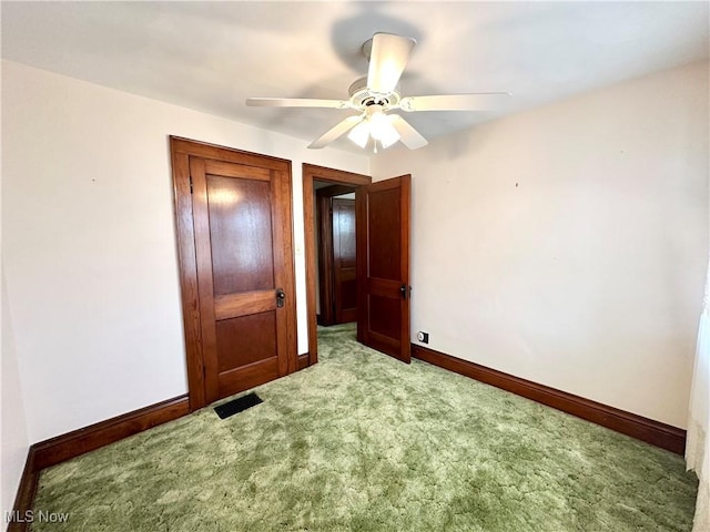 808 Gilbert Ave, Follansbee, WV 26037 - unfurnished bedroom featuring carpet flooring, baseboards, and ceiling fan