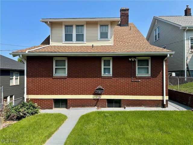 808 Gilbert Ave, Follansbee, WV 26037 - back of property featuring a chimney, roof with shingles, and brick siding