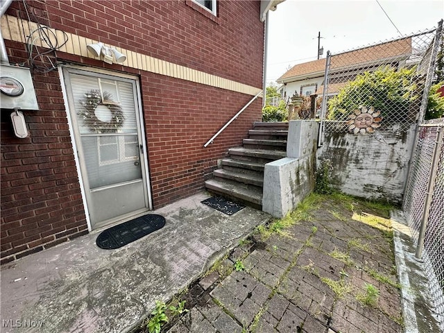 808 Gilbert Ave, Follansbee, WV 26037 - doorway to property with brick siding