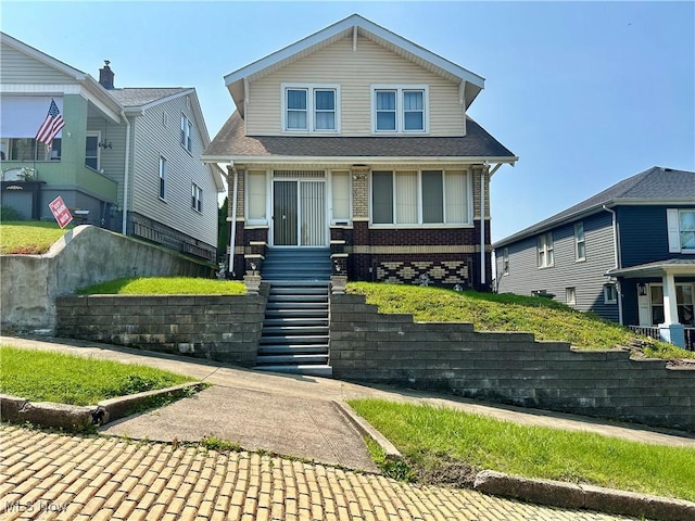 808 Gilbert Ave, Follansbee, WV 26037 - view of front of home with brick siding, stairway, and a shingled roof