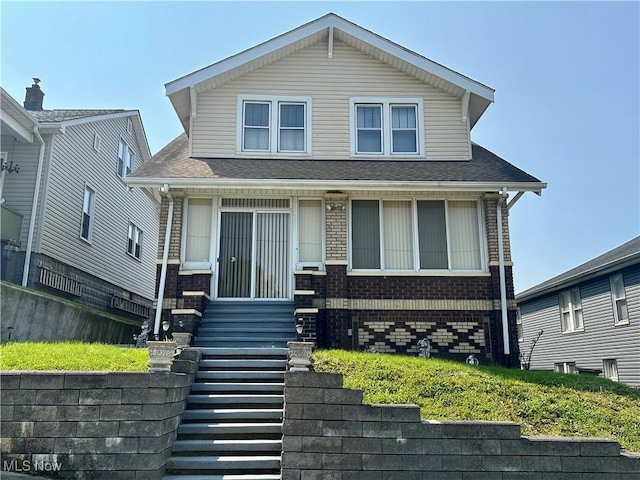 808 Gilbert Ave, Follansbee, WV 26037 - view of front of home featuring brick siding, entry steps, and roof with shingles
