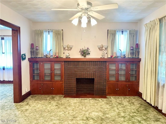 808 Gilbert Ave, Follansbee, WV 26037 - carpeted living room featuring ceiling fan, a brick fireplace, and baseboards