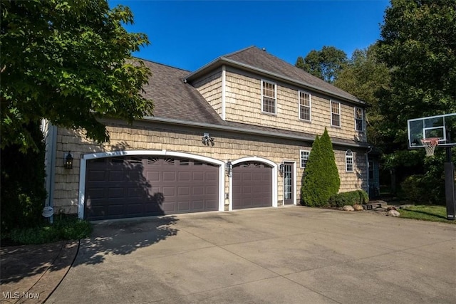 4679 Paxton Rd, Copley, OH 44321 - view of home's exterior featuring driveway and an attached garage