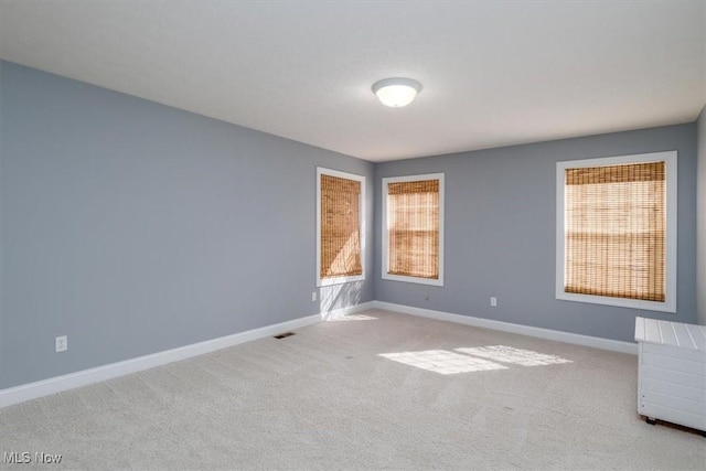 4679 Paxton Rd, Copley, OH 44321 - carpeted spare room with baseboards