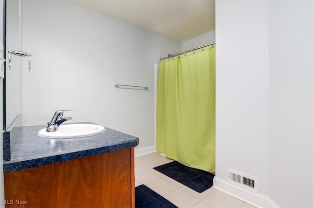 4679 Paxton Rd, Copley, OH 44321 - bathroom featuring vanity, tile patterned floors, and a shower with curtain