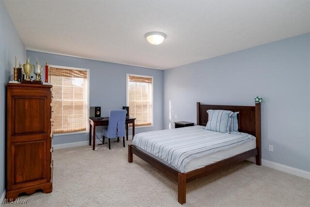 4679 Paxton Rd, Copley, OH 44321 - carpeted bedroom featuring baseboards and a desk