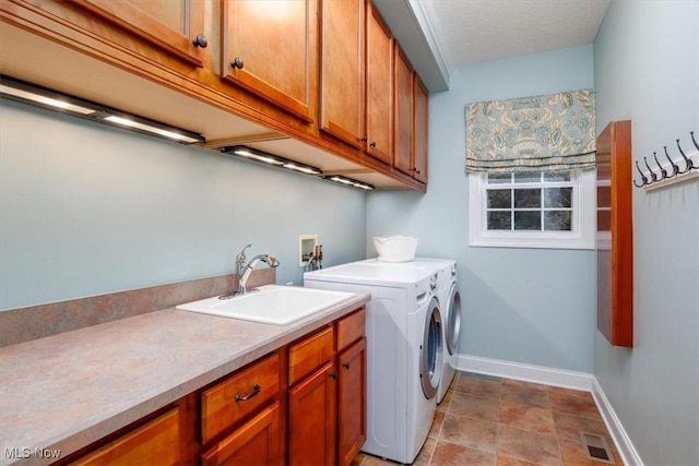 4679 Paxton Rd, Copley, OH 44321 - laundry room featuring cabinet space and independent washer and dryer