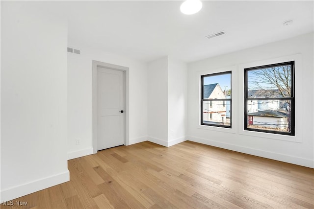 1904-2 E 123rd St, Cleveland, OH 44106 - unfurnished room featuring light wood-style floors and baseboards