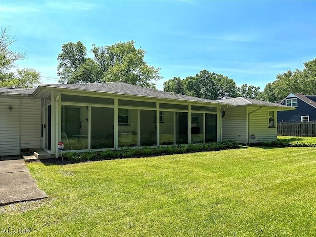 195 Fairlawn Ave, Niles, OH 44446 - back of house featuring a sunroom and a shingled roof