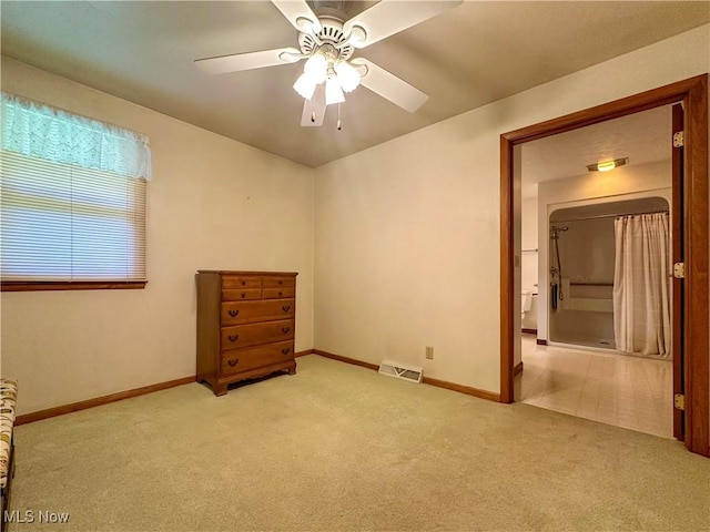 195 Fairlawn Ave, Niles, OH 44446 - unfurnished bedroom featuring carpet floors, baseboards, and a ceiling fan