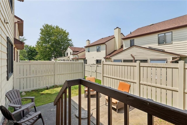 47 Tudor Ln Unit 6C, Kent, OH 44240 - wooden terrace with a fenced backyard and a residential view