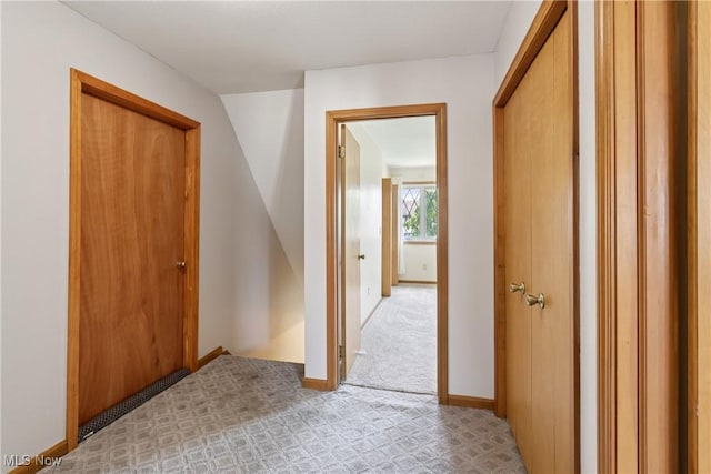 47 Tudor Ln Unit 6C, Kent, OH 44240 - hall with light colored carpet and baseboards