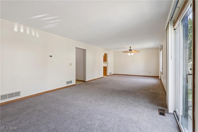 47 Tudor Ln Unit 6C, Kent, OH 44240 - empty room featuring carpet floors, a ceiling fan, and baseboards