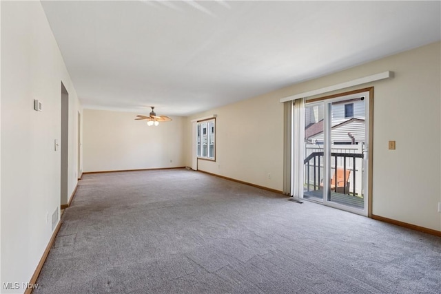 47 Tudor Ln Unit 6C, Kent, OH 44240 - spare room featuring carpet flooring, plenty of natural light, and baseboards