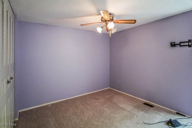 3888 Lake Run Blvd, Stow, OH 44224 - empty room featuring a ceiling fan, carpet, and baseboards