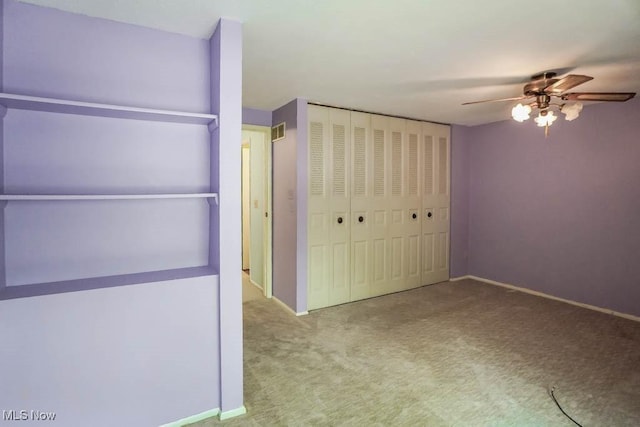 3888 Lake Run Blvd, Stow, OH 44224 - unfurnished bedroom with carpet flooring, a closet, baseboards, and a ceiling fan