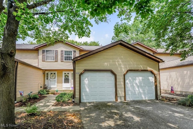 3888 Lake Run Blvd, Stow, OH 44224 - view of front of home with a garage and driveway