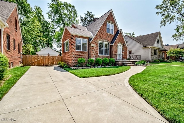 4315 W 215th St, Fairview Park, OH 44126 - english style home featuring brick siding and roof with shingles