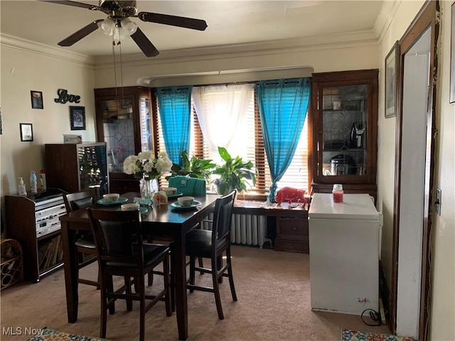 3526 E Blvd, Cleveland, OH 44105 - dining room with a ceiling fan, crown molding, and carpet flooring
