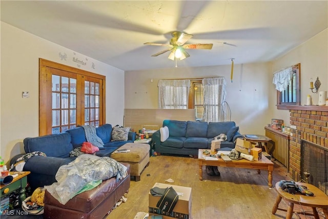 310 N Bentley Ave, Niles, OH 44446 - living room featuring wood finished floors, plenty of natural light, ceiling fan, and french doors