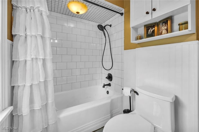 1167 Croyden Rd, Lyndhurst, OH 44124 - bathroom featuring shower / bath combination with curtain, toilet, and wainscoting