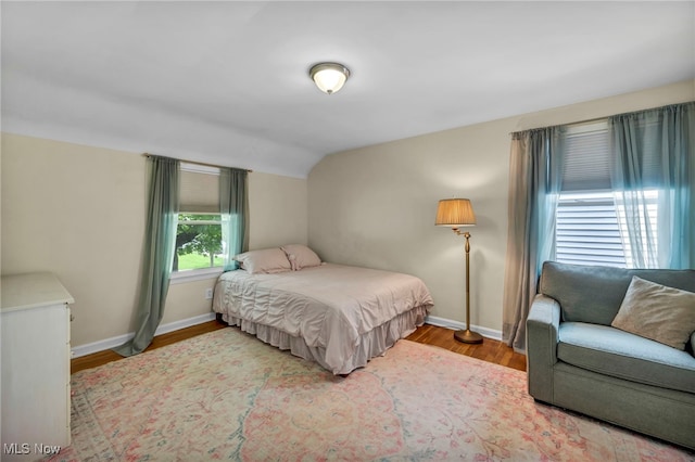 1167 Croyden Rd, Lyndhurst, OH 44124 - bedroom with lofted ceiling, wood finished floors, and baseboards