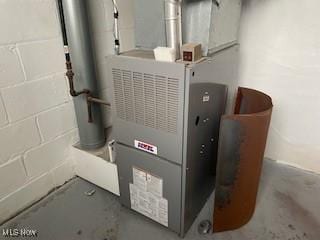 200 Stewart Ave NW, Massillon, OH 44646 - utility room with heating unit