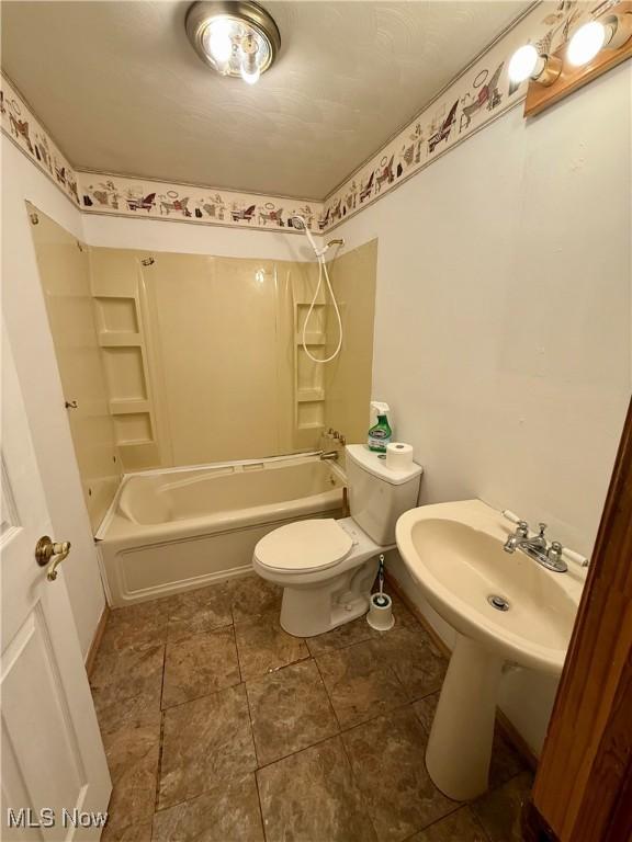 47 Walker Manor Cir, Colliers, WV 26035 - bathroom featuring shower / washtub combination and tile patterned flooring