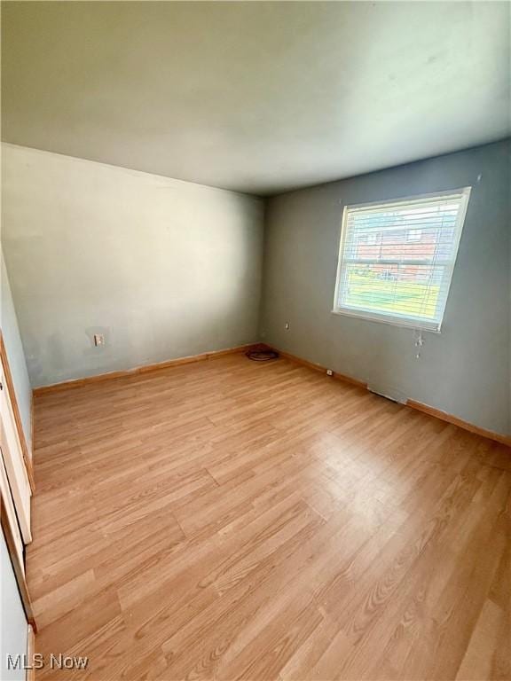 47 Walker Manor Cir, Colliers, WV 26035 - unfurnished room featuring light wood-style floors and baseboards